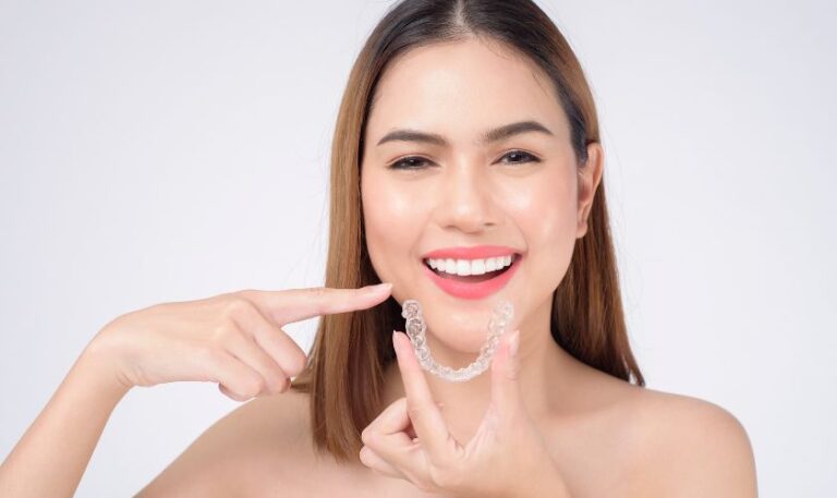 Patient smile improvement after Invisalign treatment